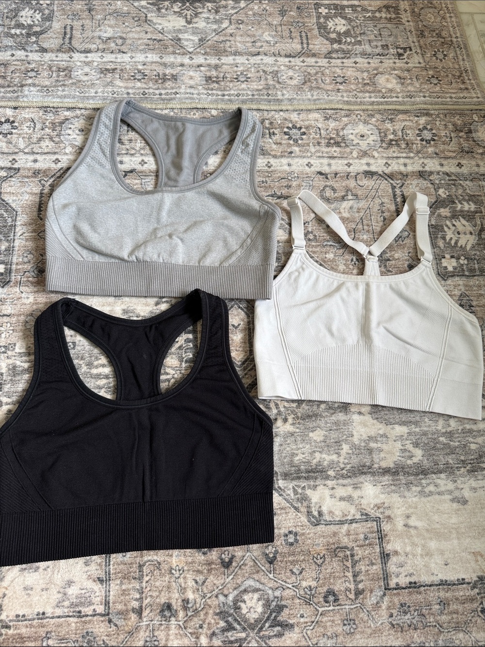Target Racerback Sports Bra Trio in Black (M), Light Gray (M), and white (S)